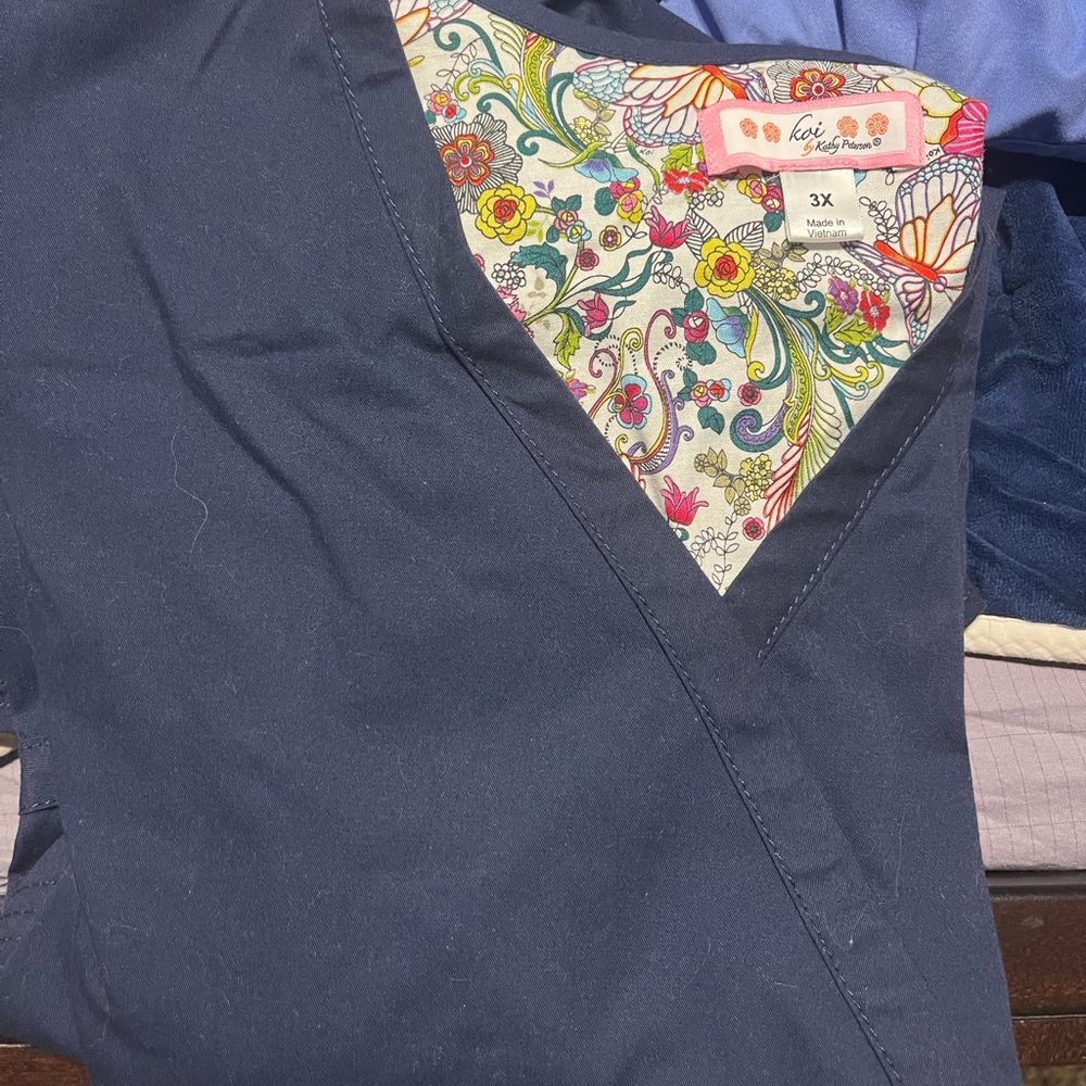 Koi Women's Navy Scrub Top with Floral Lining